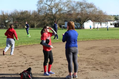 Jae LeVine gets some advice from CHS softball coach Deanna Rafferty.