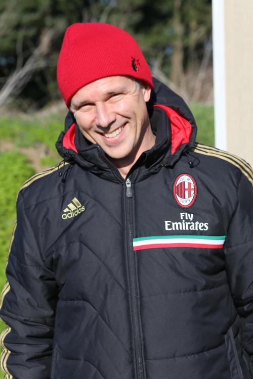 Wolf soccer coach Kyle Nelson can't feel his hands, but he's still smiling.