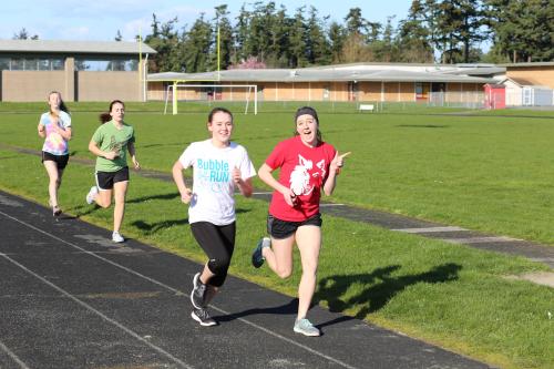 Lauren Grove (right) and Abby Parker always know where the cameraman is hiding. Always.