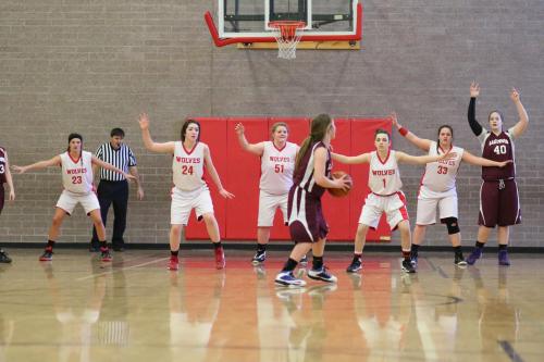 The 8th grade varsity clamps down on defense.