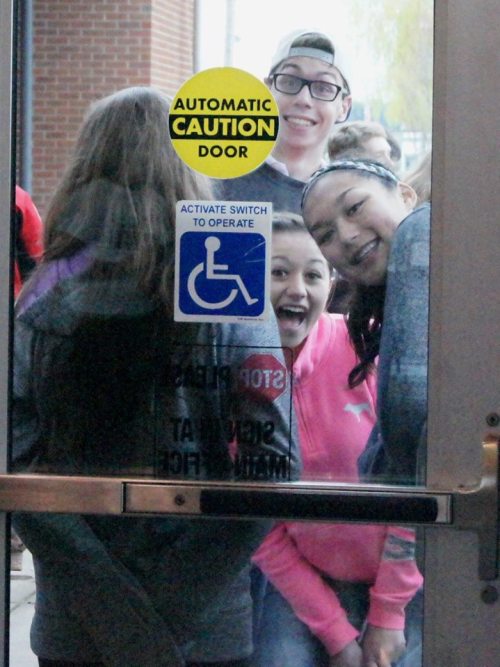 Jared Helmstadter, Makana Stone and McKenzie Bailey (pink) threaten to break the door down. (Shelli Trumbull photos)