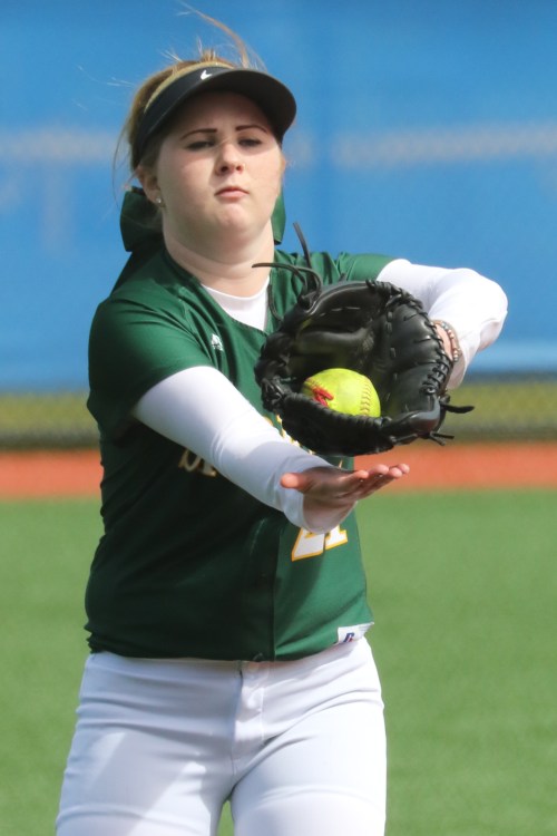 "Two hands. Always two hands." Madeline Roberts knows her softball-catching skills. (John Fisken photos)