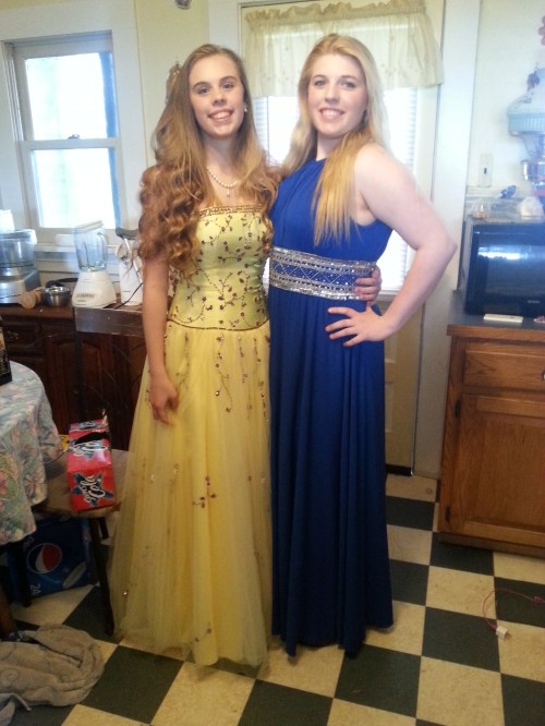 Wolf softball stars Kyla (left) and Tiffany Briscoe, dressed up for a night on the town. (Amy Briscoe photo)