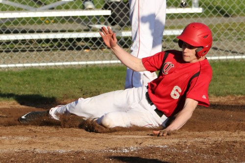 Josh Poole comes sliding in with a run.