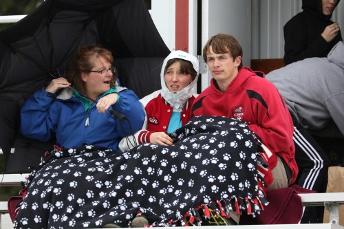 Wolf supporters Kerry Rosenkranz (left) Erin Rosenkranz and Keegan Kortuem