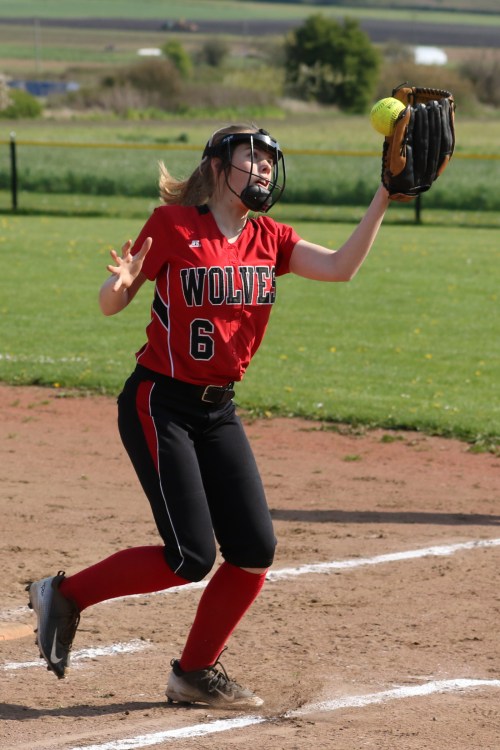 "And where do you think you're going?!?!" Kyla Briscoe refuses to let the softball get away.