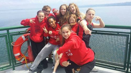 Wolf 7th grade girls celebrate on the ferry.