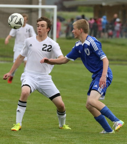 Sebastian Davis (22) and his WOlf teammates will open the playoffs on the road Saturday. (John Fisken photo)