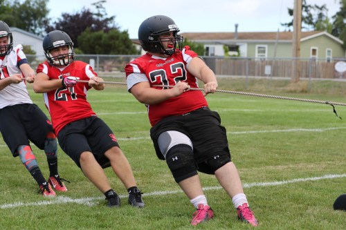 Wolf lineman Dominic Dausey digs in and makes his stand. (John Fisken photos)