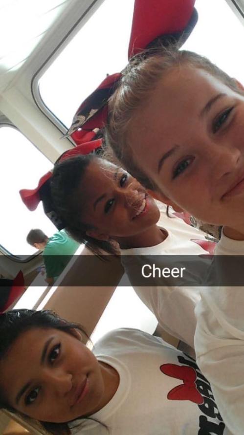 Gaby Halpin (center) with some of her CHS cheer teammates.