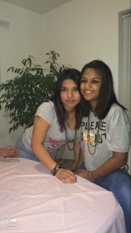 Tomi Herrera (left) hangs out with fellow Wolf cheerleader Gaby Halpin. (Photo courtesy Herrera)