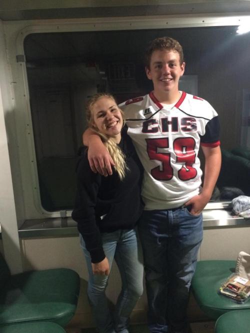 Wolf volleyball star Hope Lodell and gridiron giant Julian Welling are all smiles after the win.