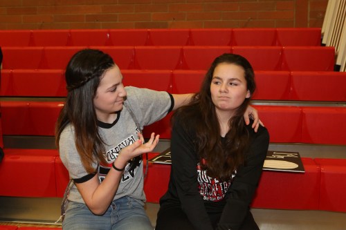 Kalia Littlejohn (left) just wants a hug from big sis Mia...