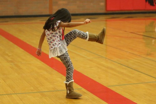 Unpaid "assistant coach" Aubrey Eck shows 'em how it's done.