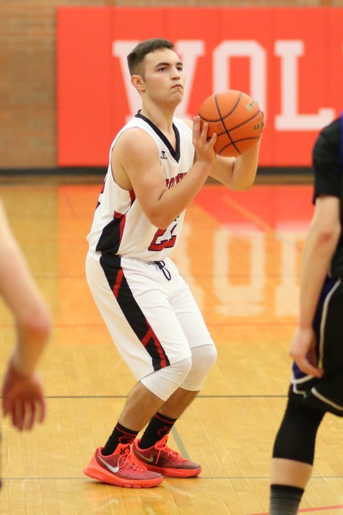JJ Johnson prepares to drop a trey on the Braves, the first points he has scored in a Wolf uniform.