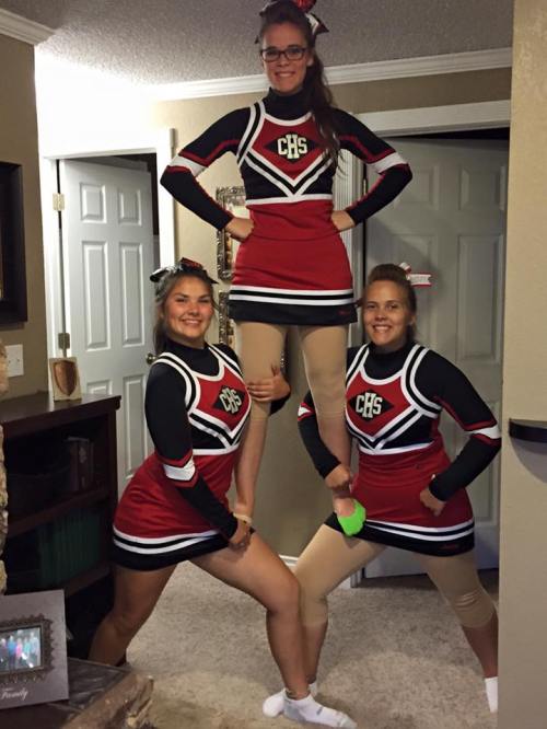 Getting a boost from Jovanah Foote (left) and sister Lainey Dickson.