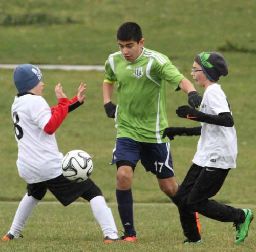 Aram Leyva (middle), seen here earlier in the season, scored a hat trick Saturday. (Pat Kelley photo)