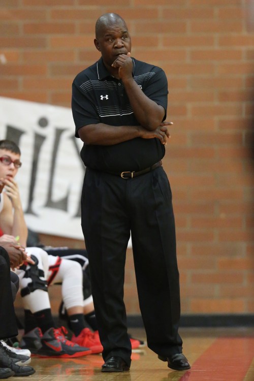 Wolf boys' basketball coach Anthony Smith has his squad in position to fight for a league title in the last week of the regular season. (John Fisken photos)