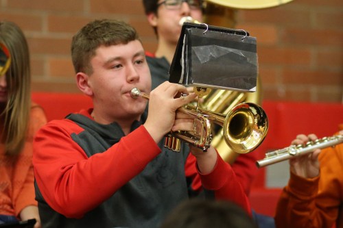 Young man with a horn.