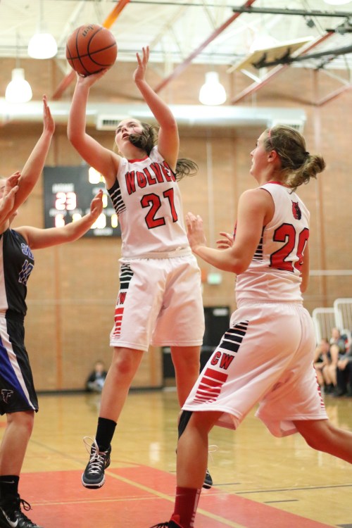 Mia Littlejohn (21), seen here in an earlier game, dropped in nine points Friday to spark Coupeville to a league win. (Sylvia Hurlburt photo)