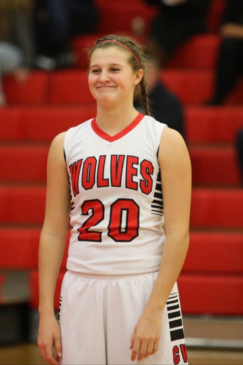 Lindsey Roberts and the Wolf varsity are all smiles at a stellar 14-4. (John Fisken photo)