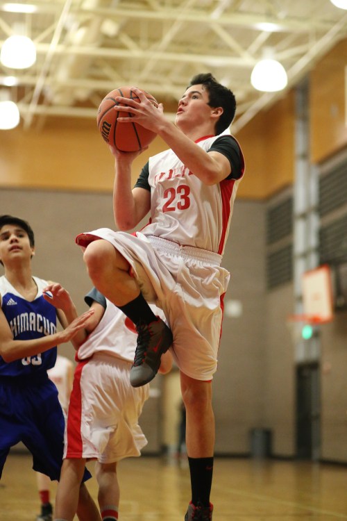 Jake Mitten, seen here in a middle school game, rumbled for ?? points in a SWISH doubleheader Saturday. (John Fisken photo)