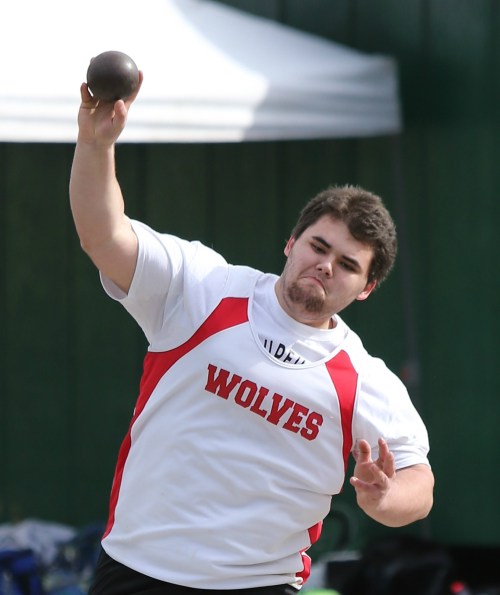 Dominic Dausey set PRs in the shot put, discus and javelin Thursday. (John Fisken photos)