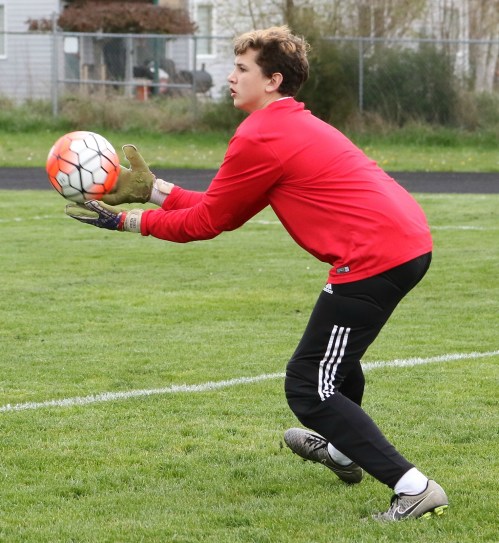 CHS goalie Brian Roberts hauls in a shot. (John Fisken photo)