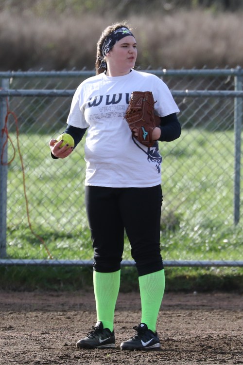 Freshman Sarah Wright will take over catching duties for the Wolves, allowing Lauren Rose to return to 3B. (John Fisken photos)