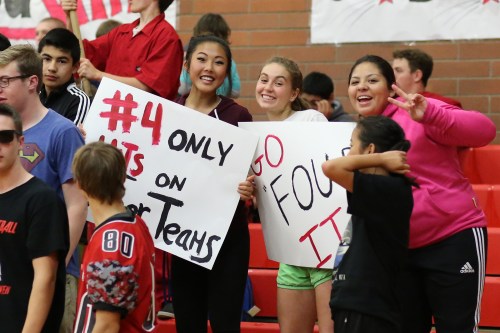 Melena helps lead the cheers with soccer mates May Rose (left) and Bree Daigneault.