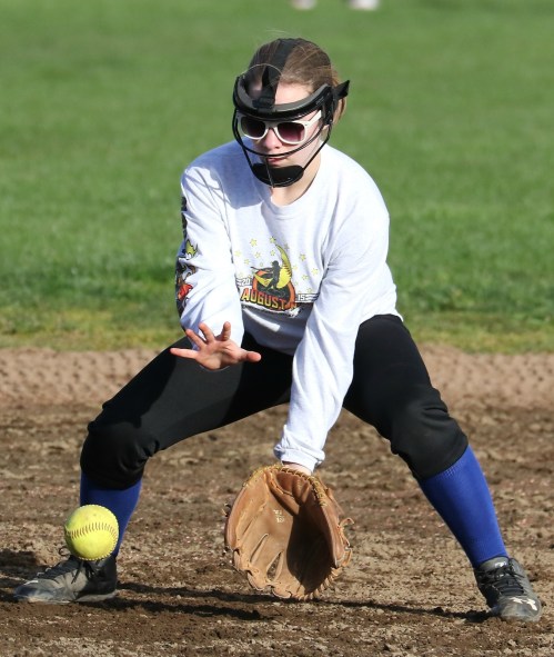 Lauren Rose, seen here during practice, absolutely abused a softball Saturday, driving a triple to deepest center field. (John Fisken photo)