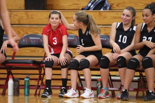 Jae shares a moment with Kayla Rose early in their volleyball careers.