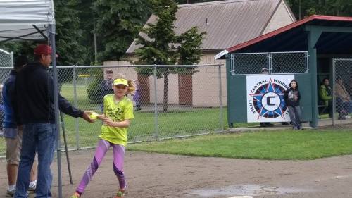 Savina Wells, sporting the day's most memorable outfit, picks up her game ball. (Paula Peters photo)
