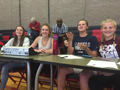 Lindsey Roberts (blue shirt) and young guns Maya Toomey-Stout (left) and Avalon Renninger (right) arrive to revive Grove's spirits.
