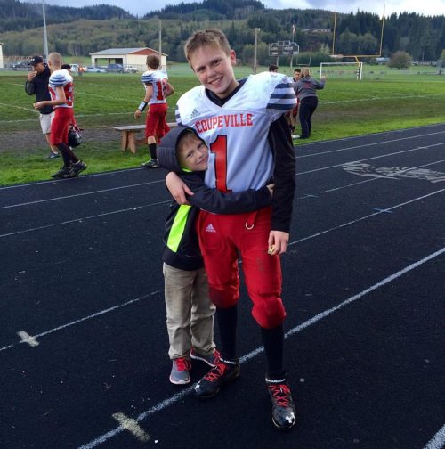 Mason Grove (right) meets the president of his fan club. (Mindy Grove photo)
