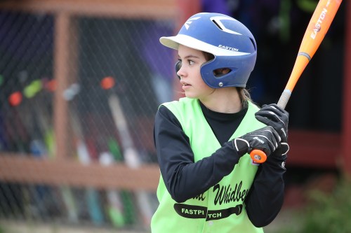Toomey-Stout waits for her pitch, mere seconds away from unleashing her gazelle-like speed.