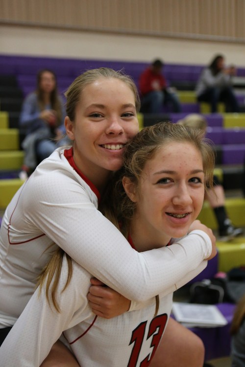 Lauren Rose (left), Emma Smith and the CHS spikers will play five straight matches at home to start next season. (John Fisken photos)