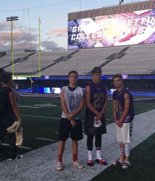 CHS quarterback Hunter Downes (center), with 