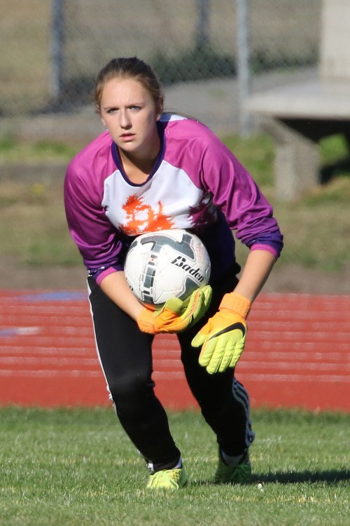 "You dare to shoot on ME?!?!" Wolf goalie Lauren Grove suffers no fools. (John Fisken photos)