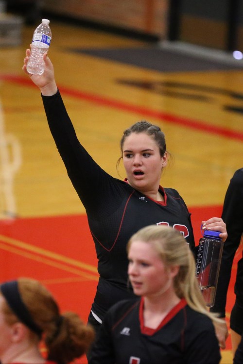 When she's not busy keeping her teammates hydrated, Sarah Wright likes to destroy the souls of her rival spikers. (John Fisken photo)