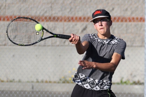 Nick Etzell finished third in singles play, earning a trip to districts.