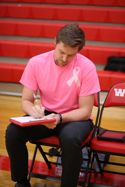 First-year CHS volleyball coach Cory Whitmore has guided the Wolf spikers to their first league title since 2004. (John Fisken photo)