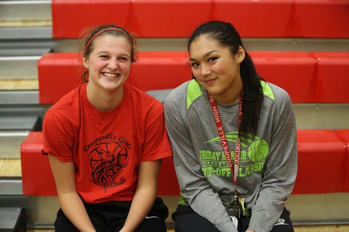 Makana Stone (right) seen here last year with Wolf teammate Lindsey Roberts, is off to a strong start as a college hoops player. (John Fisken photo)