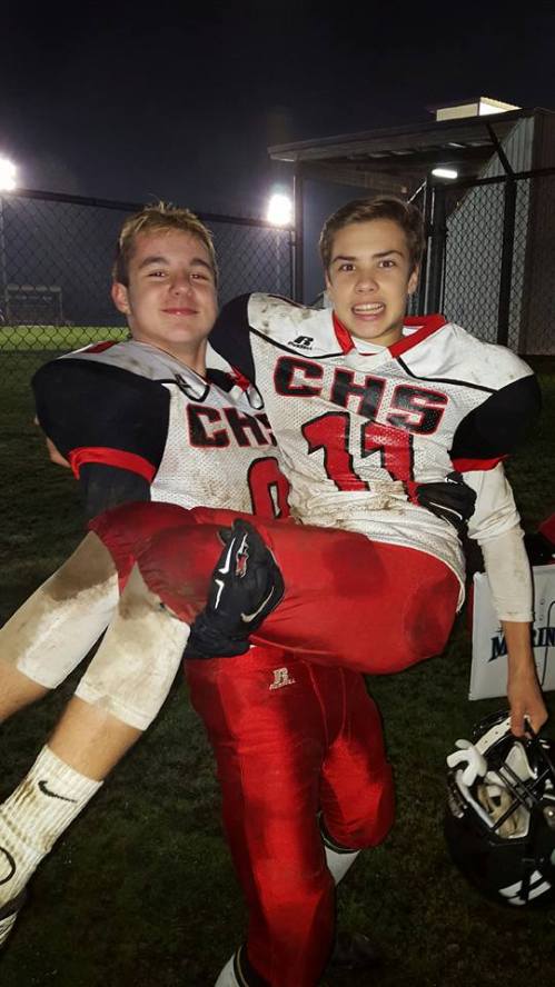 Hoagland gives teammate Cameron Toomey-Stout a ride. (LIsa Jenne photo)