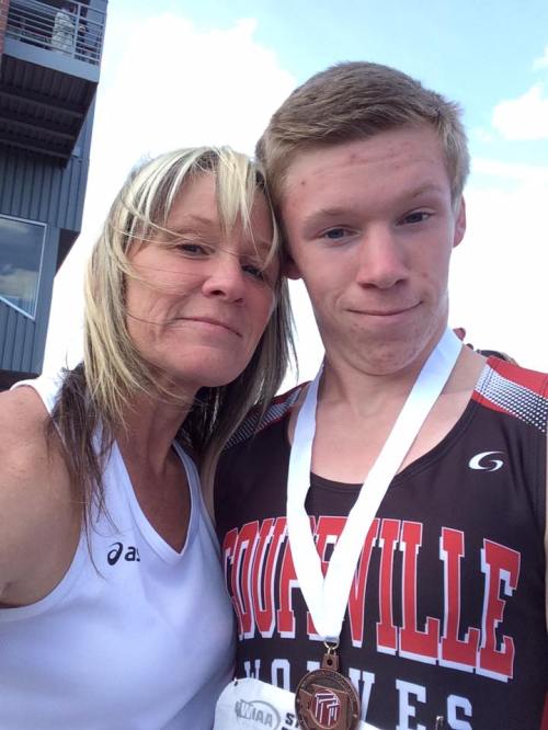 Deb Smith, seen here with son Jacob at the state track meet last spring, is leading a drive to help Coupeville's homeless.