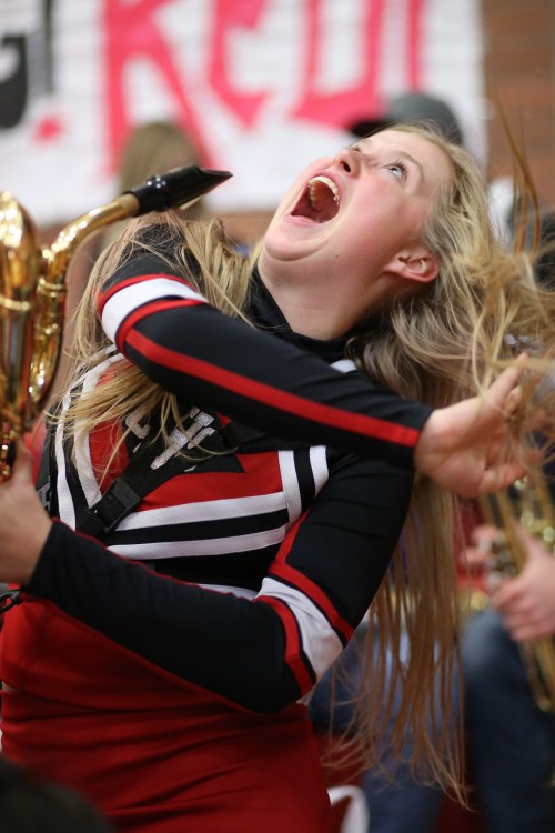 CHS cheerleader Mckenzie Meyer offers an interpretive dance version of what it would be like to be on a ferry right now. (John Fisken photo)
