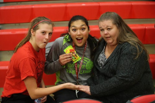 Makana Stone (center), seen here back in the day with Lindsey Roberts (left) and Amy Briscoe, had another string college hoops game Saturday. (John Fisken photo)