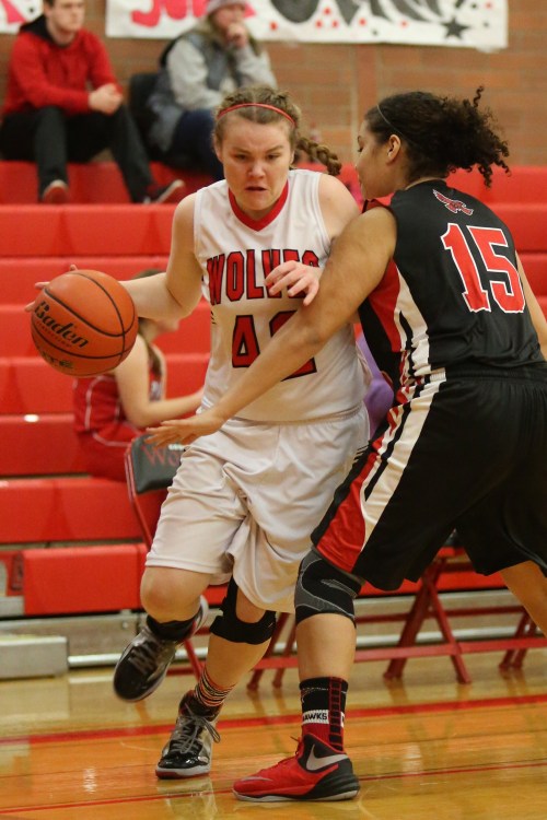 Kailey Kellner busts through the defense, on her way to rattling home another bucket. (John Fisken photos)